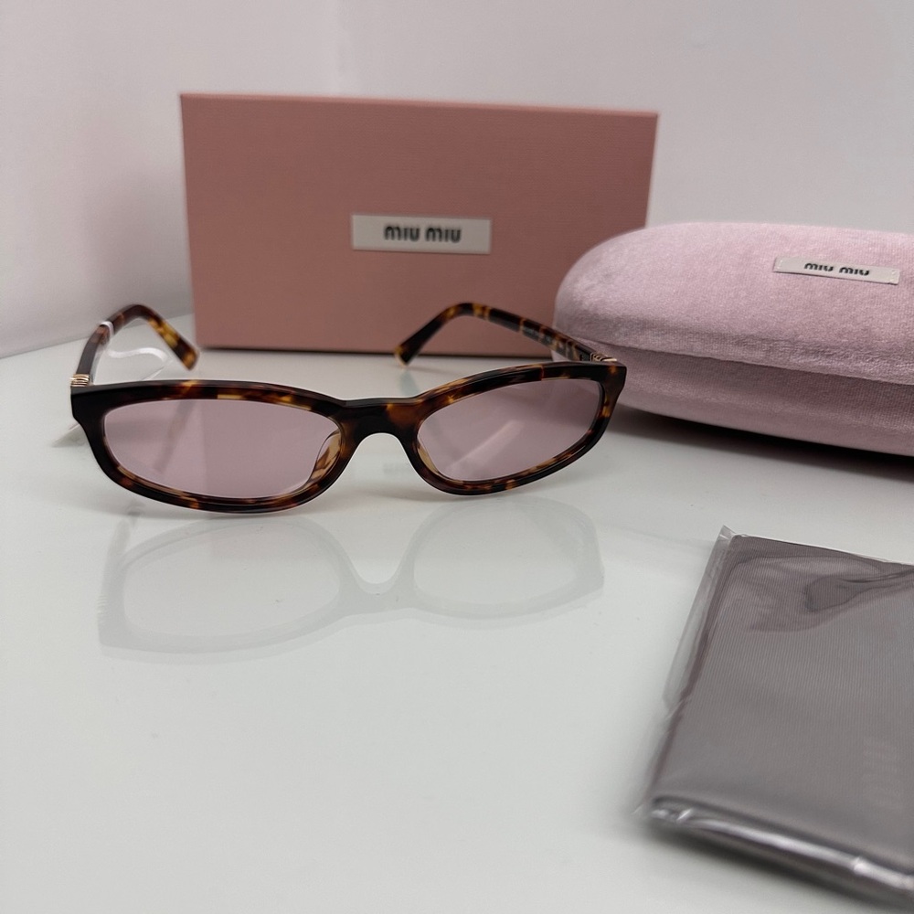 Miu Miu Regard Tortoise Frame Sunglasses with Pink Tint